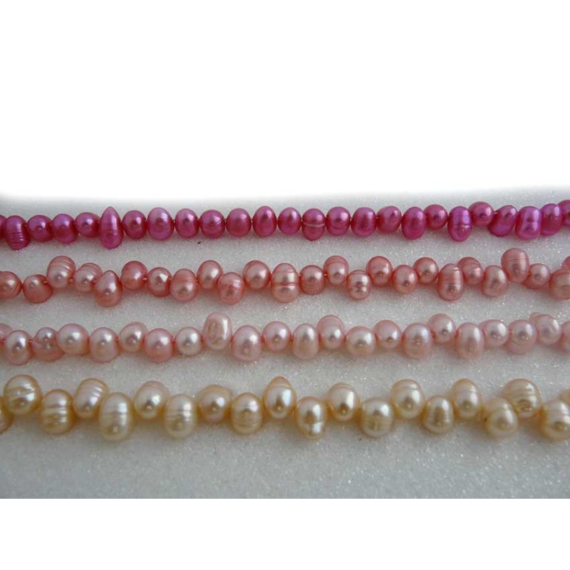Perles d'eau douce ovales 8-10mm rose fuchsia X4